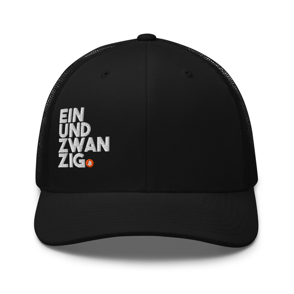 Einundzwanzig bitcoin trucker cap, front view: a black trucker cap with mesh side panels, EIN UND ZWAN ZIG embroidered in white across four lines with a small orange bitcoin coin.