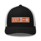 Front view of a black and white bitcoin trucker cap.