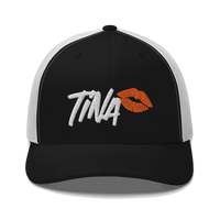 Front view of a black and white bitcoin trucker cap.