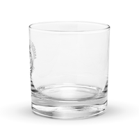 Anarcho Late Night Harlekin rocks glass, clear 10.5 oz whiskey glass with a round badge showing a grinning bear flexing its arm, an anarchy A on the biceps, the words ANARCHO LATE NIGHT arched above and HARLEKIN below, left side view with the badge at the left edge.