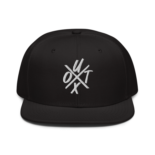 UTXO bitcoin snapback hat, front view: UTXO embroidered in white, the letters set around a large X, on a snapback with a flat brim.