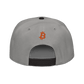 Back view of a grey and black bitcoin snapback hat.