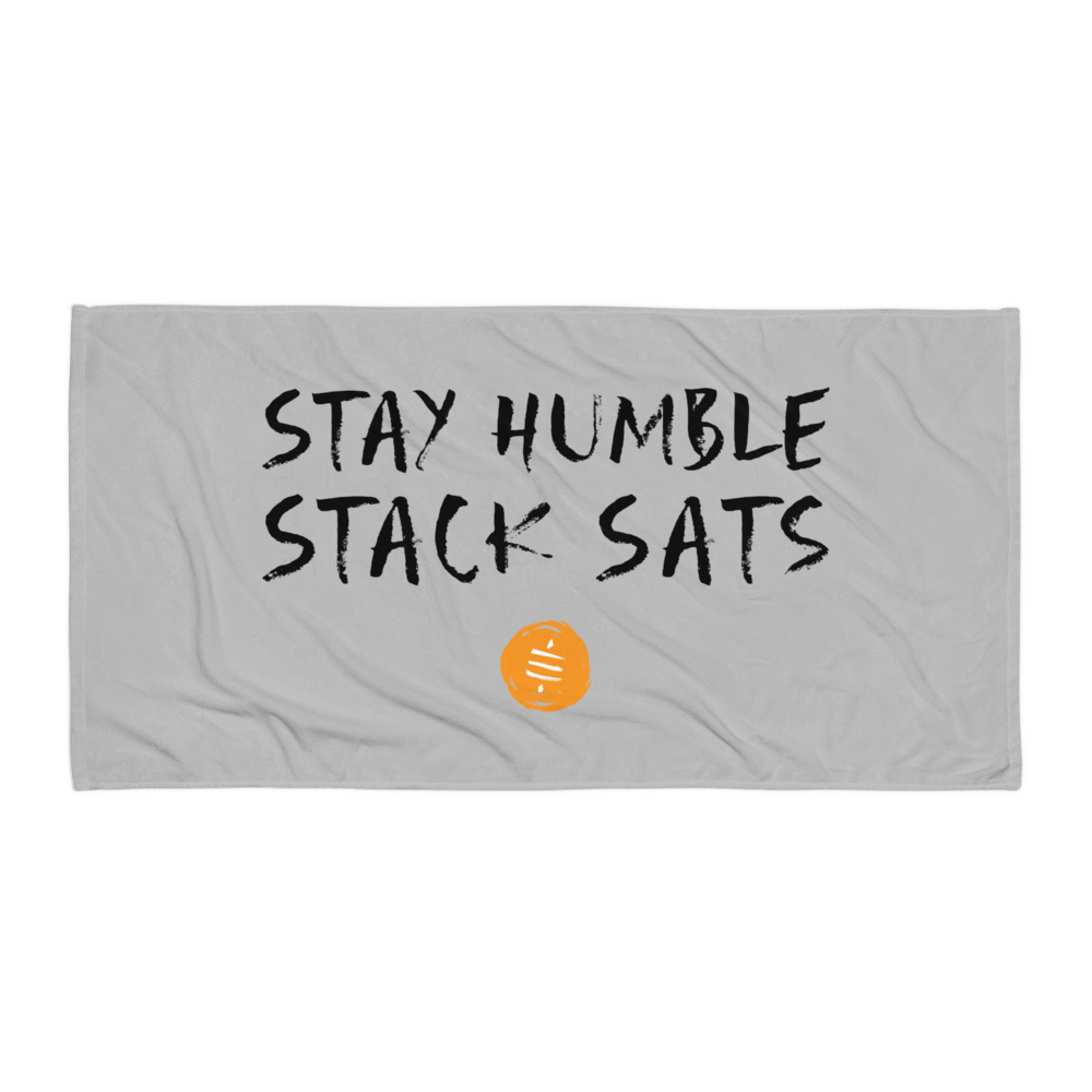 Front view of a silver stay humble stack sats bitcoin towel.