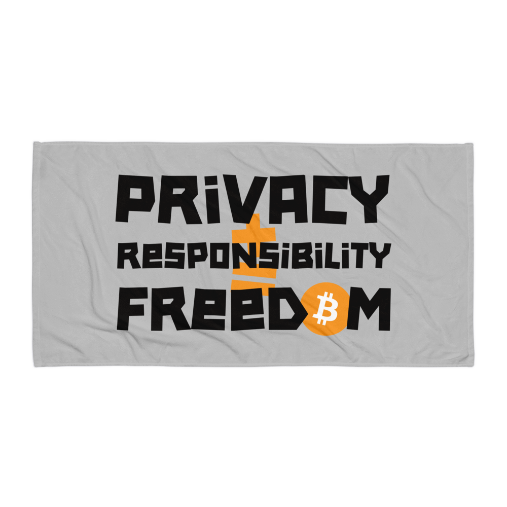 Front view of a silver privacy + resposibility = freedom bitcoin towel.