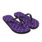 Side view of a pair of purple and black nostr flip flops.