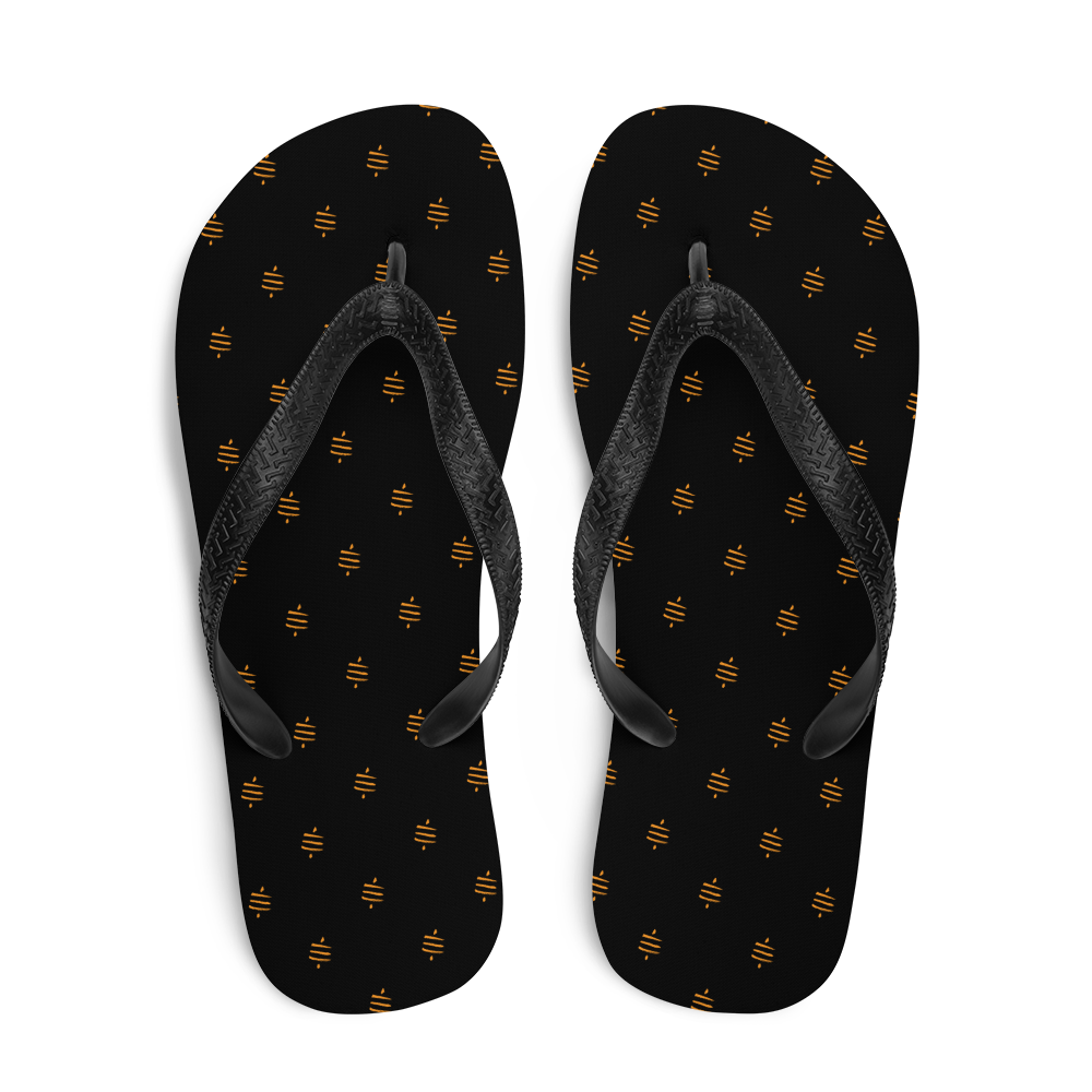 Top view of a pair of black bitcoin flip flops.