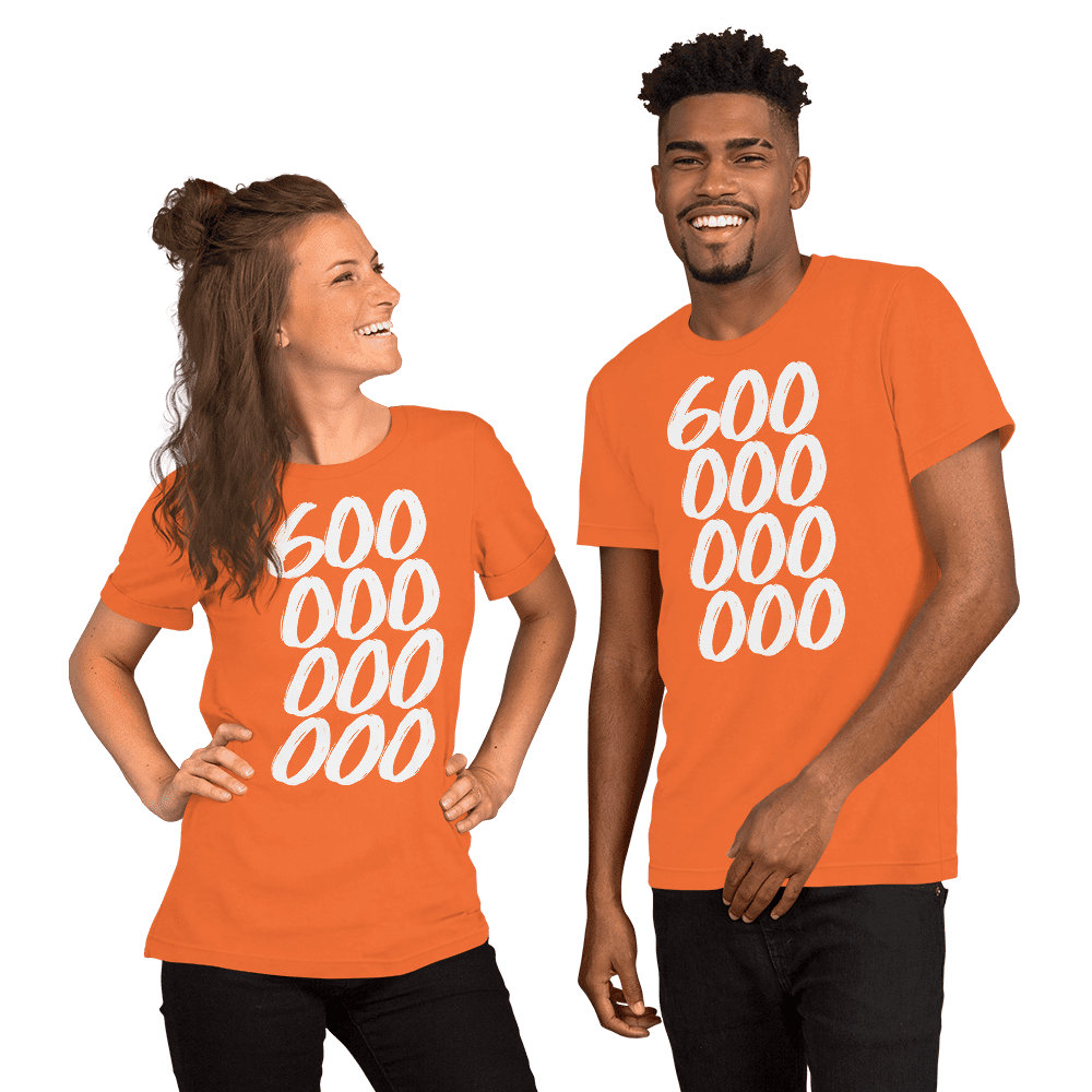 A couple wearing orange bitcoin shirts.