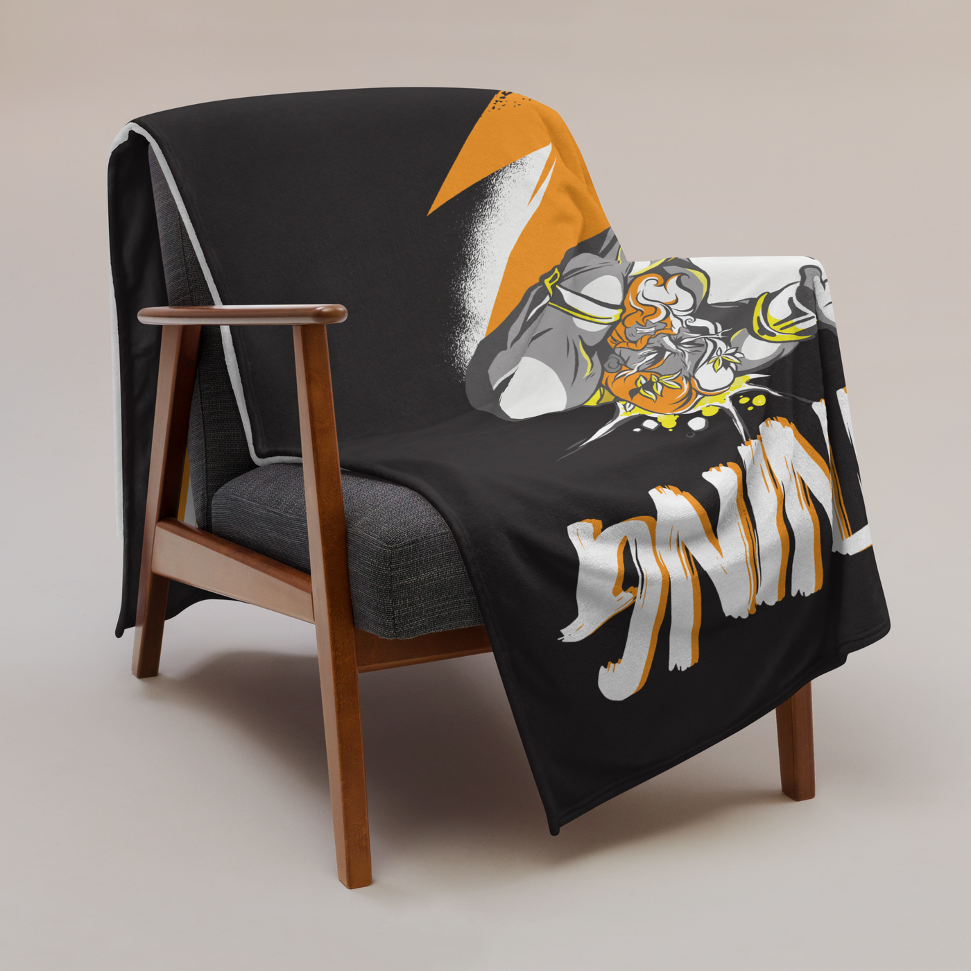 Zeus Supporter Bitcoin throw blanket draped over a wooden armchair, showing the design across the full width of the blanket.