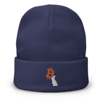 Navy blue beanie with embroidered white rabbit and orange Bitcoin logo, cozy and form-fitting knit hat.